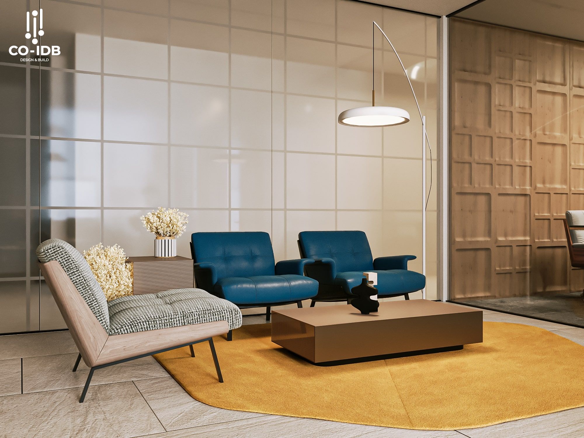 Góc chờ văn phòng thiết kế tinh giản với ghế bọc nỉ xanh navy, thảm tròn vàng nghệ tương phản nổi bật, tường kính mờ tạo chiều sâu và cảm giác riêng tư cho không gian tiếp khách.