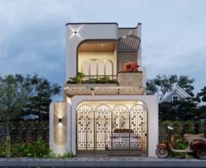 Cổng chính bằng sắt uốn nghệ thuật họa tiết hình vòm cong màu vàng đồng thanh lịch đặt dưới hệ khung bê tông vòm tròn mặt tiền nhà phố
