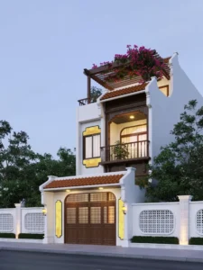 Cổng gỗ dáng vòm cổ điển có mái lợp ngói âm dương, kết hợp tường bao sơn trắng và ô cửa gạch bông gió phong cách Đông Dương