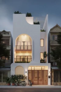Cổng nhà phố làm bằng nan gỗ màu nâu sáng hiện đại kết hợp mặt tiền sơn trắng có ban công vòm