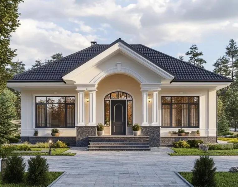 Mẫu nhà cấp 4 mái Nhật mặt tiền 10m tân cổ điển màu trắng kem, sảnh chính mái vòm cong, cửa chính màu đen và sân lát gạch xám.