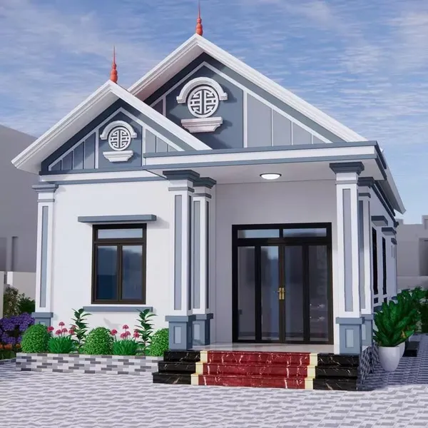 Mẫu nhà cấp 4 mái Thái nông thôn hiện đại màu trắng phối xanh ghi, mặt tiền có bậc tam cấp ốp đá đỏ vân mây nổi bật và hệ cửa nhôm kính tối màu.