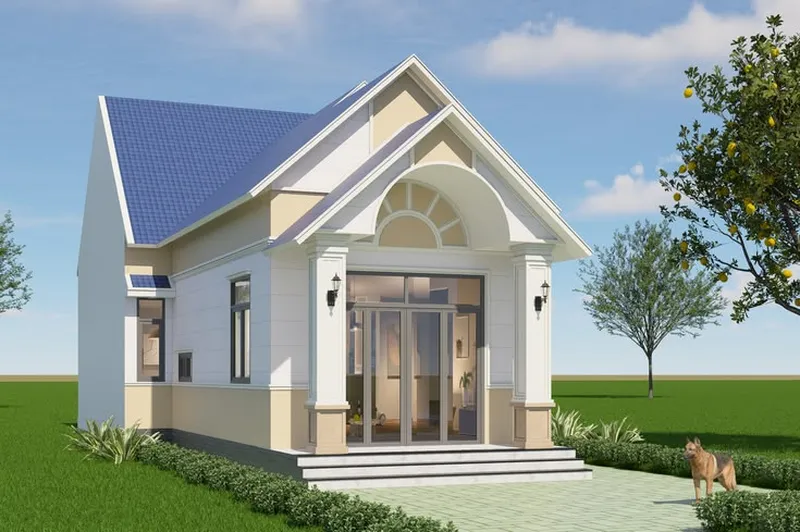 Mẫu nhà cấp 4 mái Thái đơn giản màu trắng phối vàng kem, có sảnh hiên hình vòm, hệ cột vuông kiên cố và cửa kính bốn cánh hiện đại.