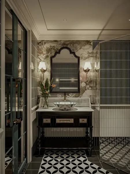 Phòng tắm phong cách Indochine với bàn lavabo gỗ tối màu, gương soi nghệ thuật và gạch bông họa tiết